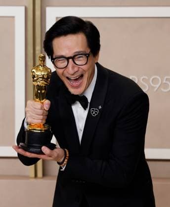 Ke Huy Quan winner of the award for Best Supporting Actor, for ???Everything Everywhere All at Once??? appears backstage with her Oscar during the 95th annual Academy Awards at Loews Hollywood Hotel in the Hollywood section of Los Angeles on Sunday, March 12, 2023.  LAP20230312178 JOHNxANGELILLO
