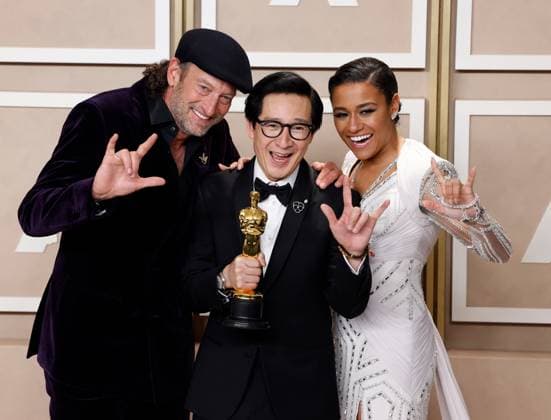 (L-R) Troy Kotsur, Ke Huy Quan, winner of the Best Actor In A Supporting Role award for Everything Everywhere All At Once and Ariana DeBose appear backstage during the 95th annual Academy Awards at Loews Hollywood Hotel in the Hollywood section of Los Angeles on Sunday, March 12, 2023.  LAP20230312181 JOHNxANGELILLO