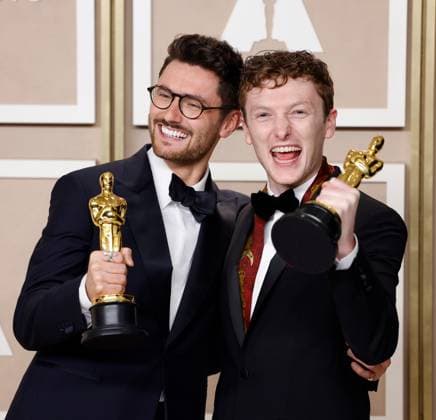 (L-R) Tom Berkeley and Ross White, winners of the award for Best Short Film (Live Action) for An Irish Goodbye, appear backstage with their Oscar during the 95th annual Academy Awards at Loews Hollywood Hotel in the Hollywood section of Los Angeles on Sunday, March 12, 2023.  LAP20230312197 JOHNxANGELILLO
