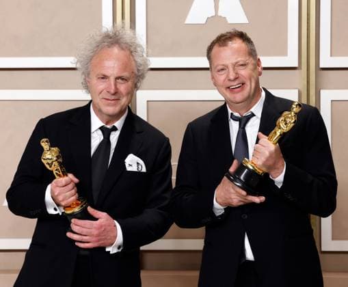 (L-R) Charlie Mackesy and Matthew Freud, winners of the award for Best Animated Short Film award for The Boy, The Mole, The Fox And The Horse, appear backstage with their Oscars during the 95th annual Academy Awards at Loews Hollywood Hotel in the Hollywood section of Los Angeles on Sunday, March 12, 2023.  LAP20230312208 JOHNxANGELILLO