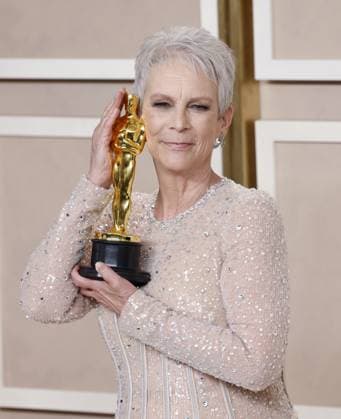 Jamie Lee Curtis, winner of the award for Best Supporting Actress for Everything Everywhere All At Once, appears backstage with her Oscar during the 95th annual Academy Awards at Loews Hollywood Hotel in the Hollywood section of Los Angeles on Sunday, March 12, 2023.  LAP202303128003 JohnxAngelillo