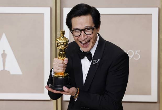 Ke Huy Quan winner of the Best Supporting Actor, for Everything Everywhere All at Once appears backstage with an Oscar during the 95th annual Academy Awards at Loews Hollywood Hotel in the Hollywood section of Los Angeles on Sunday, March 12, 2023.  LAP202303128006 JohnxAngelillo