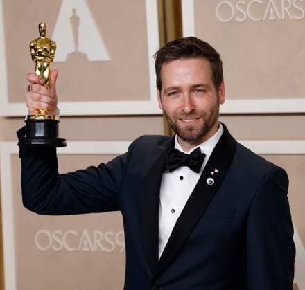 Paul Rogers, winner of the award for Best Film Editing for Everything Everywhere All at Once, appears backstage with his Oscar during the 95th annual Academy Awards at Loews Hollywood Hotel in the Hollywood section of Los Angeles on Sunday, March 12, 2023.  LAP20230312266 JOHNxANGELILLO