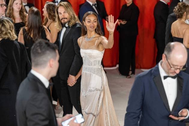 Marco Perego Saldana and Zoe Saldana arrive on the red carpet of the 95th OscarsÂ® at the DolbyÂ® Theatre at Ovation Hollywood on Sunday, March 12, 2023.  Copyright: xA.M.P.A.S.x 34494-399PLX
