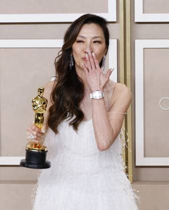 Michelle Yeoh, winner of the award for Best Actress in a Leading Role for Everything Everywhere All at Once, appears backstage with her Oscar during the 95th annual Academy Awards at Loews Hollywood Hotel in the Hollywood section of Los Angeles on Sunday, March 12, 2023.  LAP202303125002 JohnxAngelillo