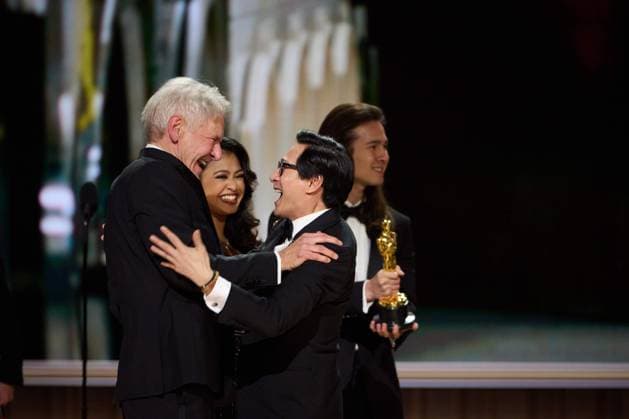 Ke Huy Quan hugs Harrison Ford who presented the OscarÂ® for Best Picture during the live ABC telecast of the 95th OscarsÂ® at the DolbyÂ® Theatre at Ovation Hollywood on Sunday, March 12, 2023.  Copyright: xA.M.P.A.S.x 34494-534PLX