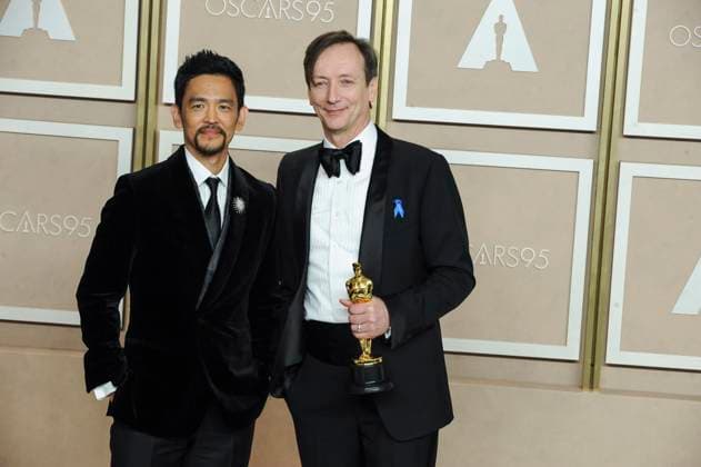 Volker Bertelmann, John Cho in the press room for 95th Academy Awards - Photo Room, Dolby Theatre, Los Angeles, CA March 12, 2023. Photo By: Elizabeth Goodenough Everett Collection in the press room for 95th Academy Awards - Photo Room, Dolby Theatre, Los Angeles, CA March 12, 2023. Photo By: Elizabeth Goodenough Everett Collection PUBLICATIONXNOTxINxCANxCHNxFRAxITAxJPNxNORxPOLxRUSxESPxUKxUSA