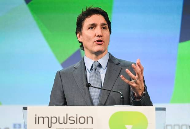March 13, 2023, Montreal, PQ, Canada: Prime Minister Justin Trudeau speaks at Impulsion, the International Summit on Electric and Smart Transportation, in Montreal, Monday, March 13, 2023. Montreal Canada  - ZUMAc35_ 20230313_zaf_c35_003 Copyright: xGrahamxHughesx