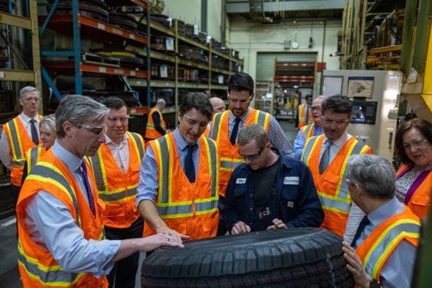 March 14, 2023, Bridgewater, NS, CANADA: Prime Minister Justin Trudeau inspects a tire on the production line at the Michelin plant in Bridgewater, N.S., Tuesday, March 14, 2023. Bridgewater CANADA  - ZUMAc35_ 20230314_zaf_c35_038 Copyright: xRileyxSmithx