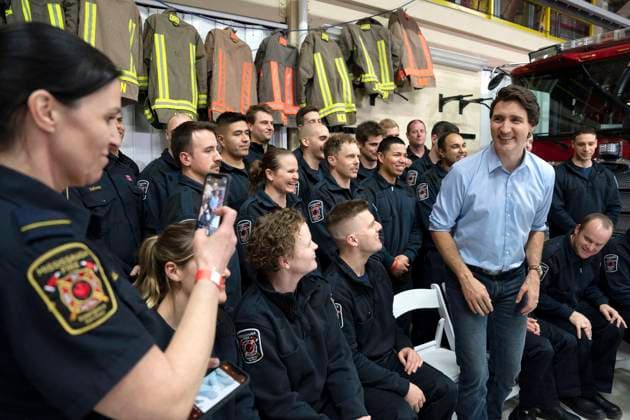 March 16, 2023, MISSISSAUGA, ON, Canada: Prime Minister Justin Trudeau greets firefighters after taking part in a town hall hosted by the International Association of Fire Fighters, in Mississauga, Ont. on Thursday, March 16, 2023. MISSISSAUGA Canada  - ZUMAc35_ 20230316_zaf_c35_109 Copyright: xChrisxYoungx