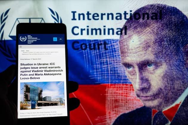 News Themen der Woche KW11 News Bilder des Tages Vladimir Putin - International Criminal Court Illustration Vladimir Putin arrest warrant seen in press release from the International Criminal Court in The Hague. On 17 March 2023 in Brussels, Belgium. (Photo Illustration by Jonathan Raa NurPhoto) Brussels Belgium  Copyright: xJonathanxRaax originalFilename: raa-vladimir230317_npFow.jpg