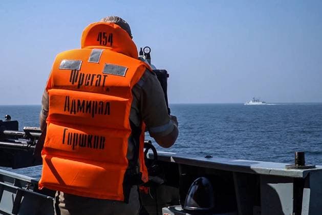MARCH 18, 2023: Seen in this video screen grab is a crew member of the Russia Navy frigate Admiral Gorshkov during a joint naval drill in the Gulf of Oman. Naval forces of China, Russia, Iran and some other countries are taking part in the Security Bond 2023 joint naval exercise in the Gulf of Oman from 15 to 19 March 2023. Video grab. Best possible quality. Northern Fleet Press Service TASS  57934446