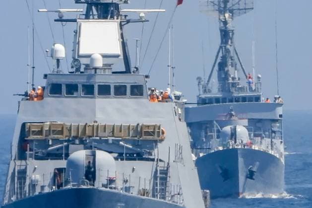MARCH 18, 2023: Seen in this video screen grab are warships during a joint naval drill in the Gulf of Oman. Naval forces of China, Russia, Iran and some other countries are taking part in the Security Bond 2023 joint naval exercise in the Gulf of Oman from 15 to 19 March 2023. Video grab. Best possible quality. Northern Fleet Press Service TASS  57934407