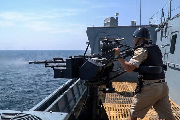 MARCH 18, 2023: Seen in this video screen grab is a crew member on a warship during a joint naval drill in the Gulf of Oman. Naval forces of China, Russia, Iran and some other countries are taking part in the Security Bond 2023 joint naval exercise in the Gulf of Oman from 15 to 19 March 2023. Video grab. Best possible quality. Northern Fleet Press Service TASS  57934448