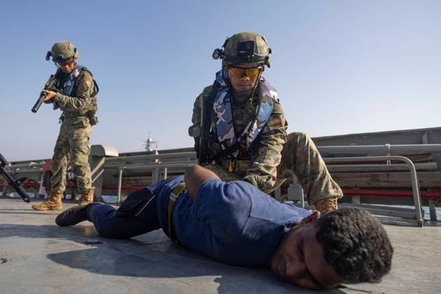 March 18, 2023, UNDEFINED, UNDEFINED, INDIAN OCEAN: A handout the Iranian Army on March 18, 2023, shows servicemen attending a Russia, China, and Iran joint naval exercises in the Gulf of Oman. Russia, China, and Iran finished a joint maritime training in the Gulf of Oman. UNDEFINED INDIAN OCEAN - ZUMAi98_ 20230318_zih_i98_001 Copyright: xIranianxArmyxOfficex