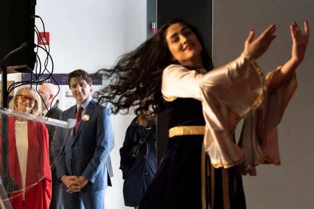 March 18, 2023, Aurora, ON, Canada: Prime Minister Justin Trudeau watches Sherry Shariat perform a Persian dance to celebrate womens freedom, as he attends a Nowruz celebration with members of the Persian community, in Aurora, Ont., on Saturday, March 18, 2023. Aurora Canada  - ZUMAc35_ 20230318_zaf_c35_065 Copyright: xChrisxYoungx