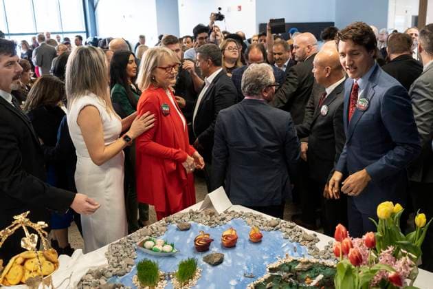 March 18, 2023, Aurora, ON, Canada: Prime Minister Justin Trudeau stands next to a table displaying a Ã’Haft-sinO as he attends a Nowruz celebration with members of the Persian community, in Aurora, Ont., on Saturday, March 18, 2023. Aurora Canada  - ZUMAc35_ 20230318_zaf_c35_069 Copyright: xChrisxYoungx