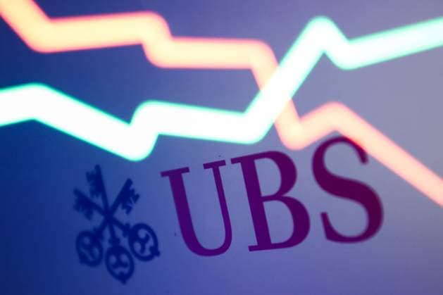 UBS Credit Suisse Takeover Photo Illustrations An illustrative stock chart displayed on a laptop screen and UBS logo displayed on a laptop screen are seen in this multiple exposure illustration photo taken in Krakow, Poland on March 19, 2023. Krakow Poland  Copyright: xJakubxPorzyckix originalFilename: porzycki-ubscredi230319_npEw2.jpg