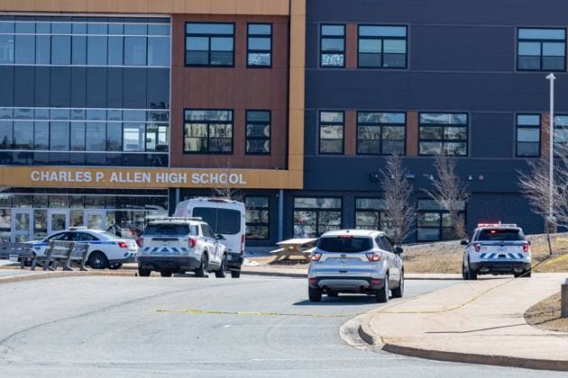 February 27, 2023, Halifax, NS, Canada: Police monitor the situation at Charles P. Allen High School in Halifax, Monday, March 20, 2023. Halifax police have arrested a student after three people were stabbed at a high school this morning. Halifax Canada  - ZUMAc35_ 20230227_zaf_c35_055 Copyright: xRileyxSmithx