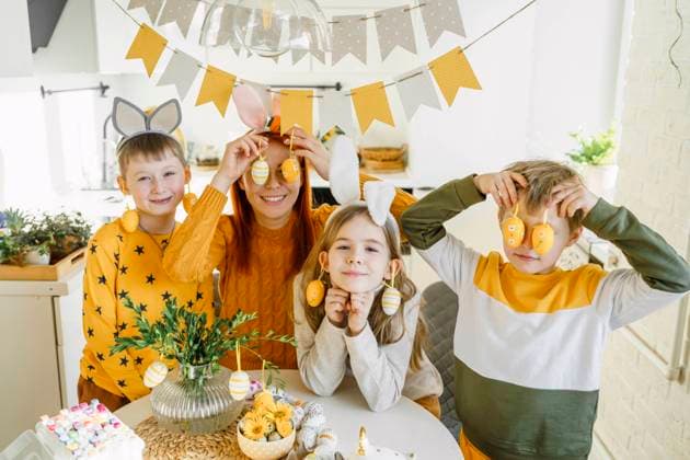 Happy family with Easter eggs having fun at home model released, Symbolfoto property released, VBUF00270
