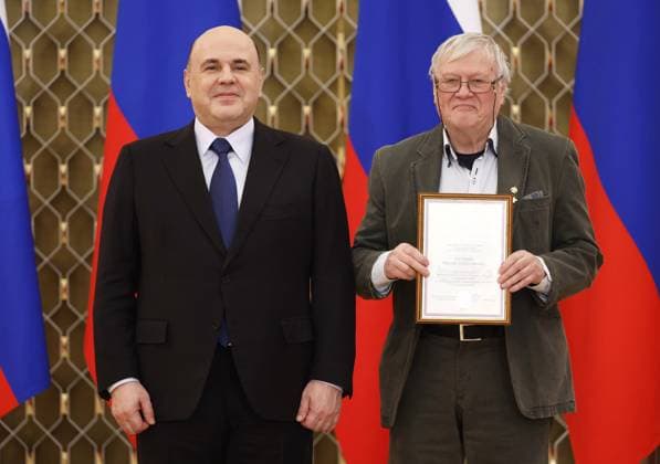 Russia Mishustin Media Award 8397986 24.03.2023 Russian Prime Minister Mikhail Mishustin presents a prize certificate to Victor Glukhov, Chairman of the Board of the regional public organization Moscow Union of Artists, during a ceremony to present government awards in the field of culture for 2022, in Moscow, Russia. Dmitry Astakhov Sputnik Moscow Russia  Copyright: xDmitryxAstakhovx