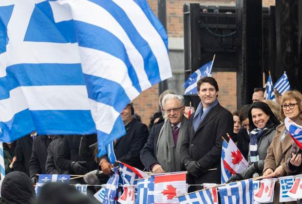 March 26, 2023, Montreal, PQ, Canada: Prime Minister Justin Trudeau, centre, looks on as attends the Greek Independence Day Parade in Montreal, Sunday, March 26, 2023. Montreal Canada  - ZUMAc35_ 20230326_zaf_c35_027 Copyright: xGrahamxHughesx