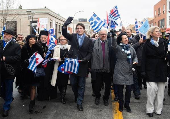 March 26, 2023, Montreal, PQ, Canada: Prime Minister Justin Trudeau, centre, waves to the crowd as he attends the Greek Independence Day Parade in Montreal, Sunday, March 26, 2023. Montreal Canada  - ZUMAc35_ 20230326_zaf_c35_028 Copyright: xGrahamxHughesx
