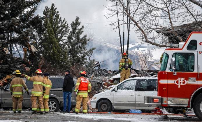 March 27, 2023, Calgary, AB, CANADA: Firefighters attend the scene of a house explosion that injured several people, destroyed one home and damaged others in Calgary, Alta., Monday, March 27, 2023. Calgary CANADA  - ZUMAc35_ 20230327_zaf_c35_096 Copyright: xJeffxMcintoshx