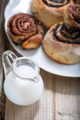 Cinnamon rolls Cinnamon rolls on a plate on a wooden background Copyright: xZoonar.com BurakovaxIrinax 13341186