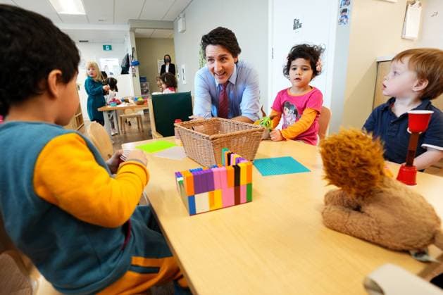 March 29, 2023, Ottawa, ON, CANADA: Prime Minister Justin Trudeau sits with children at a local child care centre in Ottawa, Wednesday, March 29, 2023. Ottawa CANADA  - ZUMAc35_ 20230329_zaf_c35_070 Copyright: xSeanxKilpatrickx