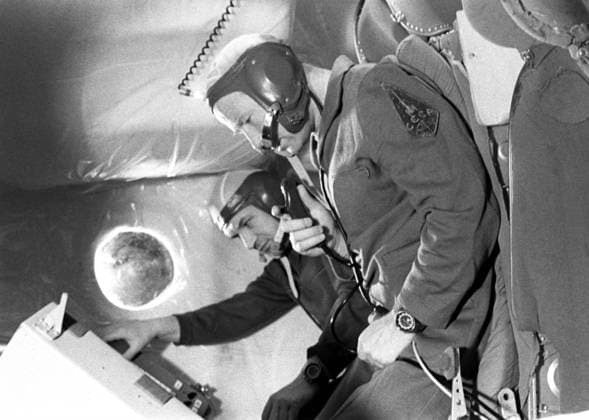Zvyozdny gorodok, Moscow Region, USSR. 1973. Heroes of the Soviet Union, Pilots-Cosmonauts of the USSR Valery Kubasov (back) and Alexei Leonov take part in preparing for the joint Soviet-American Apollo Soyuz Test Project in the Yuri Gagarin Cosmonaut Training Center. The exact date of the photograph is unknown. Albert Pushkarev TASS  193533