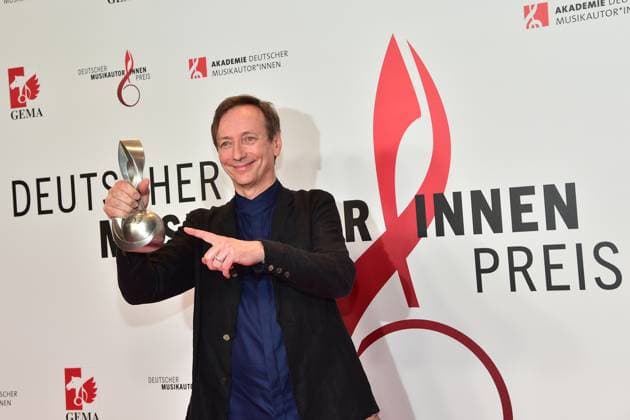 German MusicAuthorsAward 2023 AwardWinner Volker Bertelmann Composition Audiovisual Media Hoerspiel Arrival red carpet to the 14 award ceremony, German MusicAuthorsAward 2023 on March 30 in Berlin Photopress Mueller