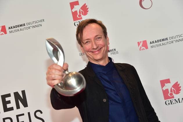 German MusicAuthorsAward 2023 AwardWinner Volker Bertelmann Composition Audiovisual Media Hoerspiel Arrival red carpet to the 14 award ceremony, German MusicAuthorsAward 2023 on March 30 in Berlin Photopress Mueller
