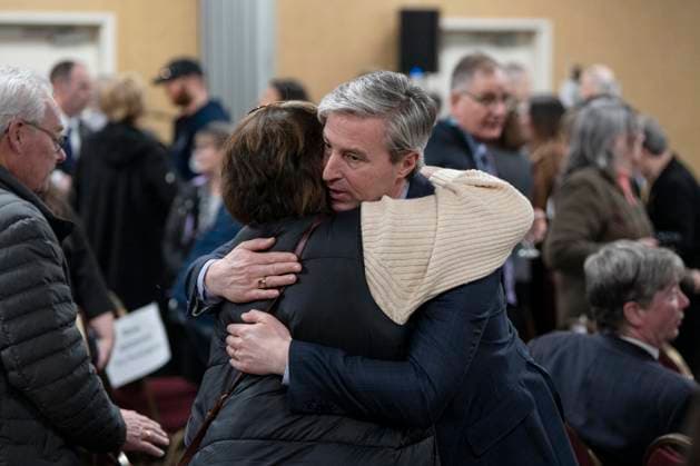March 30, 2023, Truro, NS, Canada: Premier Tim Houston, right, hugs an attendee following the release of the Mass Casualty Commission inquiry s final report into the mass murders in rural Nova Scotia in Truro, N.S. on Thursday, March 30, 2023. Truro Canada  - ZUMAc35_ 20230330_zaf_c35_019 Copyright: xDarrenxCalabresex