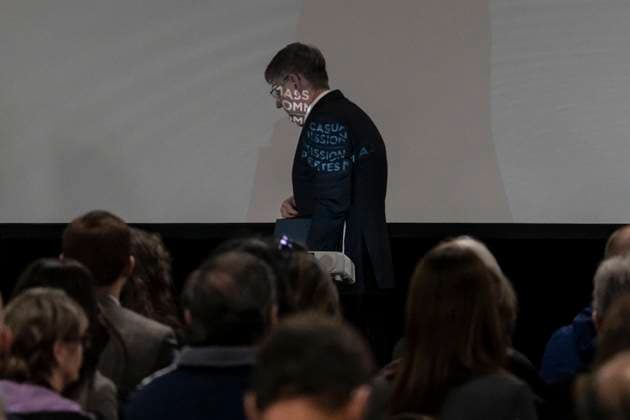 March 30, 2023, Truro, NS, Canada: Words from a projector are seen on Commissioner Michael MacDonald, chair, as he leaves the stage following the Mass Casualty Commission inquiry s final report into the mass murders in rural Nova Scotia in Truro, N.S. on Thursday, March 30, 2023. Truro Canada  - ZUMAc35_ 20230330_zaf_c35_021 Copyright: xDarrenxCalabresex