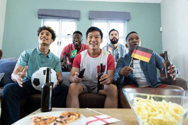 Multiracial curious male friends with beer bottles, flags and ball watching soccer match at home Multiracial curious male friends with beer bottles, flags and ball watching soccer match at home. Sport, alcohol, drink, unaltered, togetherness, social gathering, enjoyment, weekend activities., model released, , property released, Cape Town, South Africa, 2022-04-11T22:00:00.000Z, 3739425.jpg, people,multiracial,curious,male,friend,beer bottle,flag,ball,watching,soccer,match,home,sport,alcohol,drink,unaltered,togetherness,social,gathering,enjoyment,football,beverage,competition,game,leisure,championship,recreation,friendship,activity,lifestyle,goal,player,play,team,wine,active,together,stadium,fun,nation,beer,bottle Young Adult,Man,Male,Mixed