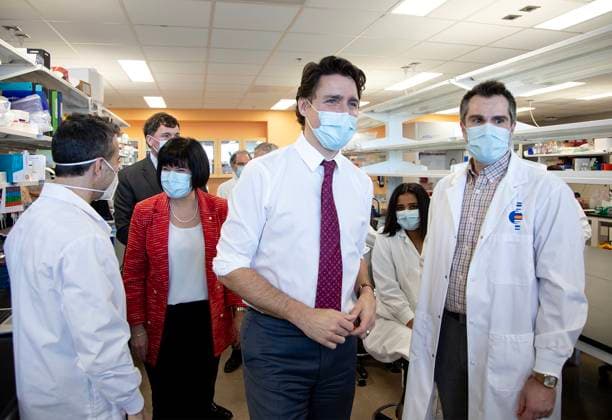 March 31, 2023, Moncton, NB, Canada: Prime Minister Justin Trudeau speaks with a researcher during a visit to a cancer research institute in Moncton, N.B., on Friday, March 31, 2023. Moncton Canada  - ZUMAc35_ 20230331_zaf_c35_068 Copyright: xRonxWardx
