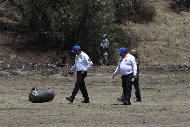 April 1, 2023, State of Mexico, Mexico: National Guard and Experts investigate the crash area, where a hot air balloon caught fire in mid-flight in the Teotihuacan archaeological zone, 2 persons died and a minor was injured as a result of of the tragic accident. on April 1, 2023 in the State of Mexico, Mexico. Teotihuacan Mexico - ZUMAe321 20230402_zia_e321_052 Copyright: xMarianaxBaex