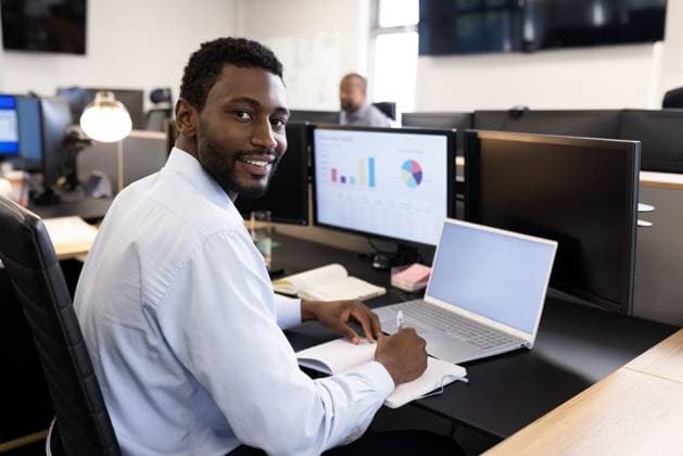 Happy african american man working on laptop in office Happy african american man working on laptop in office. Business, corporation, cooperation and working in office concept., model released, , property released, Cape Town, South Africa, 29.10.2022, 3948287.jpg, people,happy,african american,man working,laptop,office,business,corporation,cooperation,concept,computer,technology,businessman smiling,employee working,internet,outside office,financial worker,modern employee,work,happy businessman,communication,adult businessman,confident person,modern,corporate office,businessman outdoor,finance,creative employee,positive leader,person,african,american,man,working Young Adult,Man,Male,Black