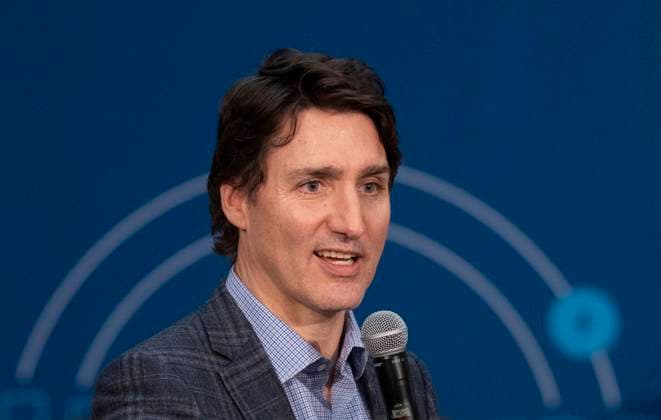 April 3, 2023, Val d Or, PQ, Canada: Prime Minister Justin Trudeau responds to a question during a town hall meeting at a lithium mine near La Corne, Que., Monday, April 3, 2023. Val d Or Canada  - ZUMAc35_ 20230403_zaf_c35_134 Copyright: xAdrianxWyldx