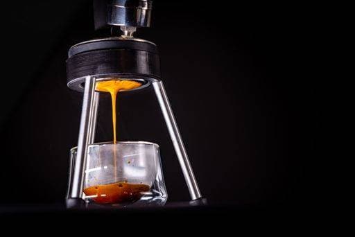 RECORD DATE NOT STATED A view of Espresso Forge and accessories in dark background *** einer Ansicht des Espresso Schmiede und Beiwerk ÊIn dunkle Hintergrund 17396960