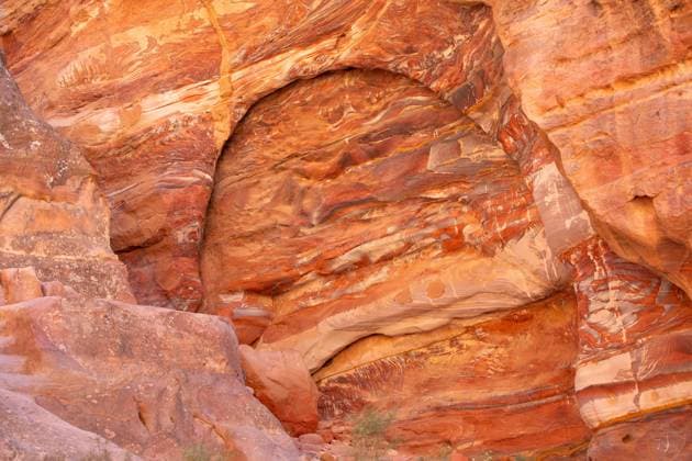 Sandstone rock and mineral layers in Petra, Jordan Multi-colored sandstone rock and mineral layers in ancient tombs of Petra, Jordan. Pattern, geological stone texture Copyright: xZoonar.com Nataliya_Nazarova{}x 19486507