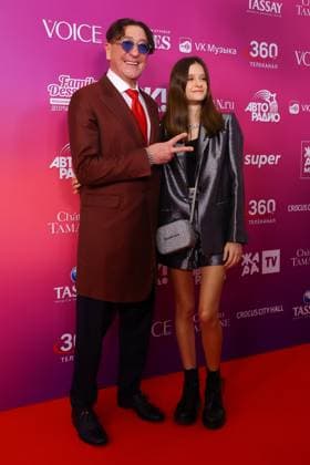 RUSSIA, KRASNOGORSK - APRIL 6, 2023: Singer Grigory Leps with his daughter Nikol is seen before a ceremony to present the 2023 Zhara Music Awards at the Crocus City Hall. Vyacheslav Prokofyev TASS  58266168