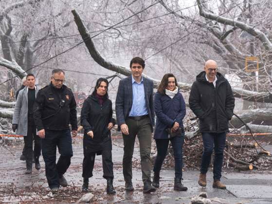 April 6, 2023, Montreal, PQ, Canada: Prime Minister Justin Trudeau and Mayor Valerie Plante look at the damage after yesterdayöÄÃ s ice storm, which left over a million customers without power, in Montreal, Thursday, April 6, 2023. Montreal Canada  - ZUMAc35_ 20230406_zaf_c35_075 Copyright: xRyanxRemiorzx