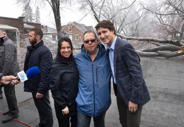 April 6, 2023, Montreal, PQ, Canada: Prime Minister Justin Trudeau and Mayor Valerie Plante pose for a photo with a local resident Thursday, April 6, 2023, after yesterdayöÄÃ s ice storm which left over a million customers without power in Montreal. Montreal Canada  - ZUMAc35_ 20230406_zaf_c35_083 Copyright: xRyanxRemiorzx