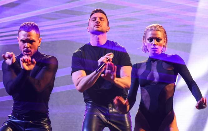 RUSSIA, KRASNOGORSK - APRIL 6, 2023: Singer Sergey Lazarev (C) performs at a ceremony to present the 2023 Zhara Music Awards at the Crocus City Hall. Vyacheslav Prokofyev TASS  58268952