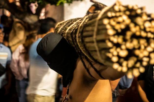 México: Good Friday in Taxco Guerrero Penitent citizen carrying sticks of thorns tied around his neck and arms. Penitents of Taxco carried out their traditional procession of the Three Fallen among cobblestone streets accompanied by sounds and prayers. During the procession you can see how the penitents flagellate themselves or carry sticks of thorns to demonstrate their faith towards God. Tourists and pilgrims arrived in the city to witness this traditional ritual. Taxco Guerrero Mexico Taxco Guerrero Copyright: LuisxSalgado
