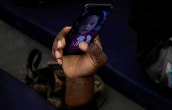 Haitian Migrants Relocated To Shelter In Mexico City A Haitian migrant looks at the photograph of his family member at the Bosque de Tlahuac facilities in Mexico City, where several people were supported by the National Institute of Migration and the Secretariat for Inclusion and Social Welfare who offered food, lodging, and migration guidance while they are waiting for a permit or Visitor s Card for Humanitarian Reasons that allows them to transit national territory between 45 and 90 days to continue their journey to the border. Mexico City Mexico City Mexico  Copyright: xGerardoxVieyrax originalFilename: vieyra-notitle230410_npfkm.jpg