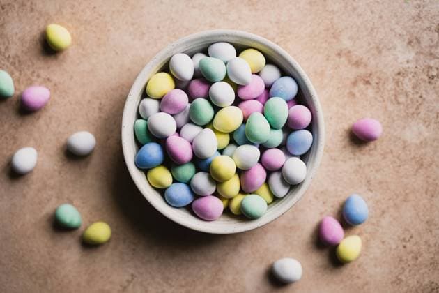 Top view of bowl of colorful mini chocolate eggs for Easter. Kingston, Ontario, Canada R_DOHO230405-1164855-01