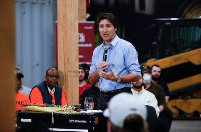 April 12, 2023, WINNIPEG, MANITOBA, CANADA: Prime Minister Justin Trudeau speaks during a town hall meeting at the Manitoba Building Trades Institute in Winnipeg, Wednesday, April 12, 2023. WINNIPEG CANADA  - ZUMAc35_ 20230412_zaf_c35_079 Copyright: xJohnxWoodsx